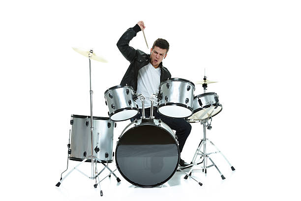 istock Excited casual man playing drums 473702972