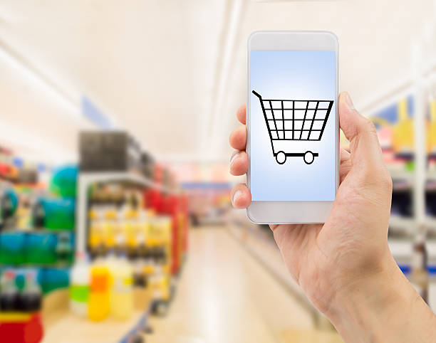 istock smartphone in supermarket 473703888