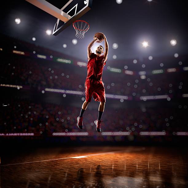 istock red Basketball player in action 473706402