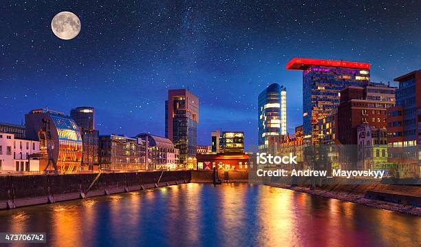 Colorful Night Scene Of Rhein River At Night In Dusseldorf Stock Photo - Download Image Now