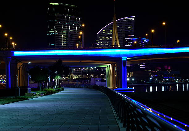 istock Business Bay Bridge at night 473707144