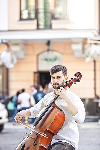 The guy who plays the cello in the street in the summer