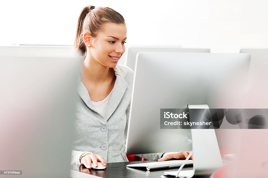 Female Computer Lab Smiling Female Student Using Computer In A Computer Lab Stock Photo ...