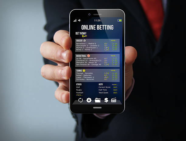istock gambling businessman smartphone 473710658