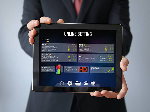 istock businessman with bet online tablet 473710680