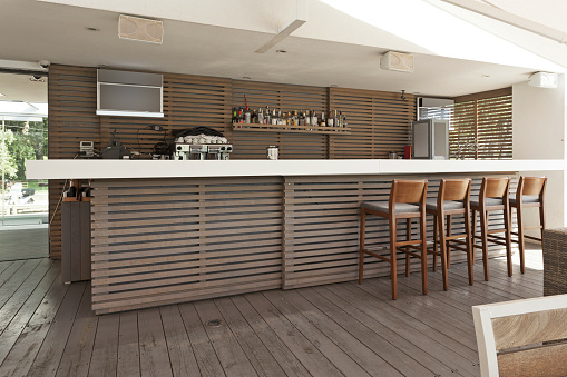 Wooden bar and chairs