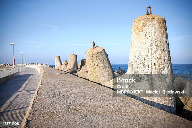 Sea Pier And Concrete Block Breakwaters Stock Photo - Download Image Now - 2015, Block Shape, Boundary