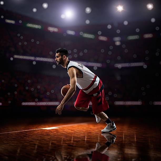 istock red Basketball player in action 473712122
