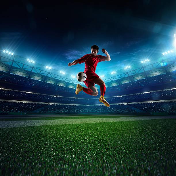 istock A football player jumping in the air 473712236