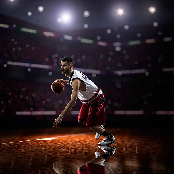 istock red Basketball player in action 473712262