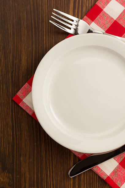 istock kitchen utensils at cloth napkin on wood 473712656
