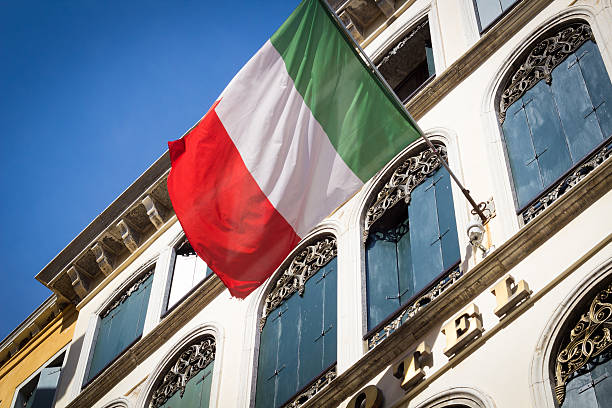 istock Italian flag at building in Venice 473712804