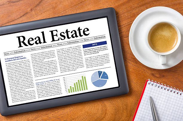 istock Tablet on a desk - Real Estate 473715528