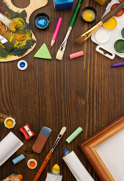 istock paint supplies and brush on wood 473718406
