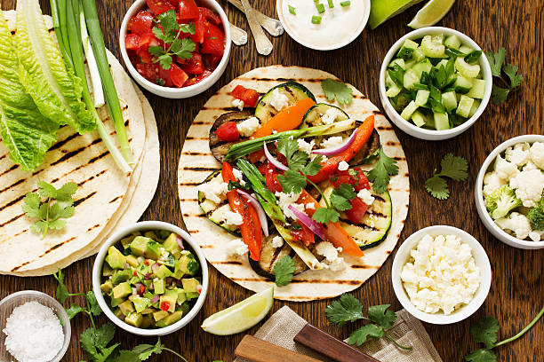 istock Vegetarian snack tacos with grilled vegetables and salsa. 473718916