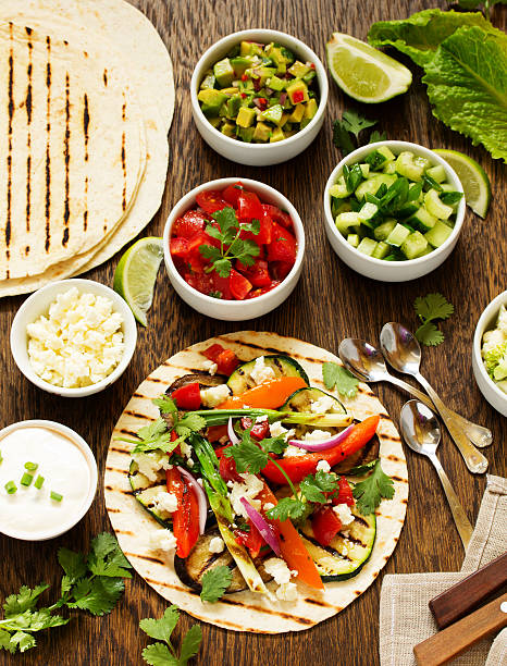 istock Vegetarian snack tacos with grilled vegetables and salsa. 473718926