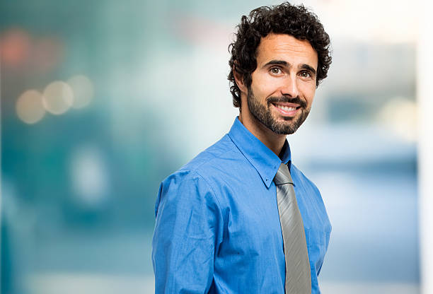 istock Handsome male manager portrait 473723384