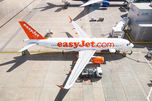 London, United Kingdom - May 7, 2015: EasyJet airlines Airbus A320 at Gatwick LGW airport while refueling.