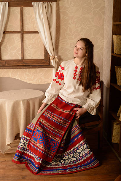 istock young woman in Slavic Belarusian national original suit studio 473727158