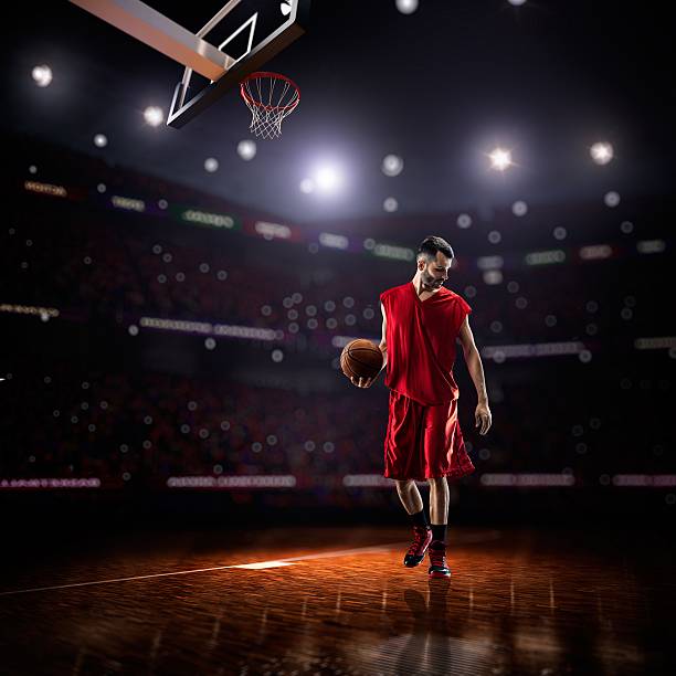 istock red Basketball player in action 473727582