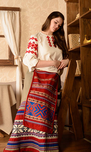 istock young woman in Slavic Belarusian national original suit studio 473727934