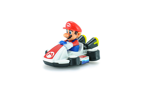 Bangkok,Thailand - May 5, 2015: Super Mario kart figure toy on white background. There are plastic toy sold as part of the McDonald's Happy meals.