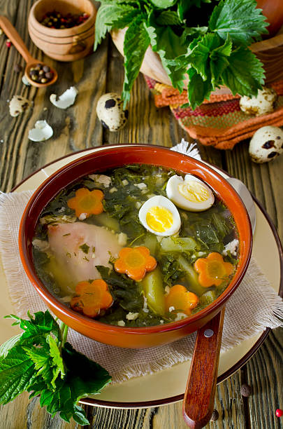 istock Nettle soup with eggs and carrot in the bowl 473734120