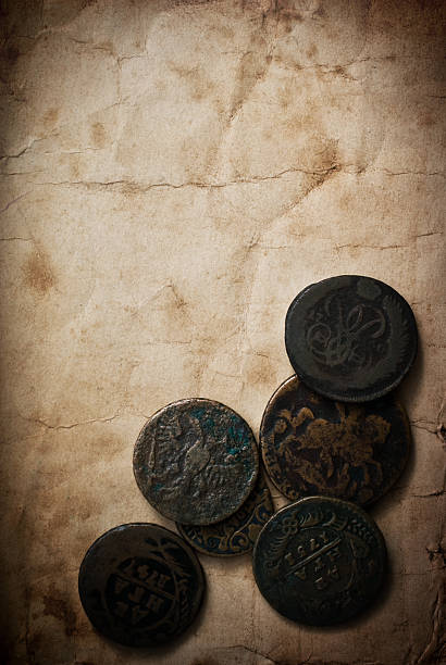 istock Vintage paper with coins 473734370