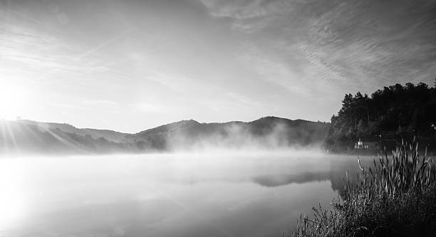 istock foggy lake at morning 473735238