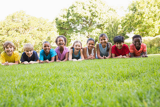 istock Happy friends in the park 473742444