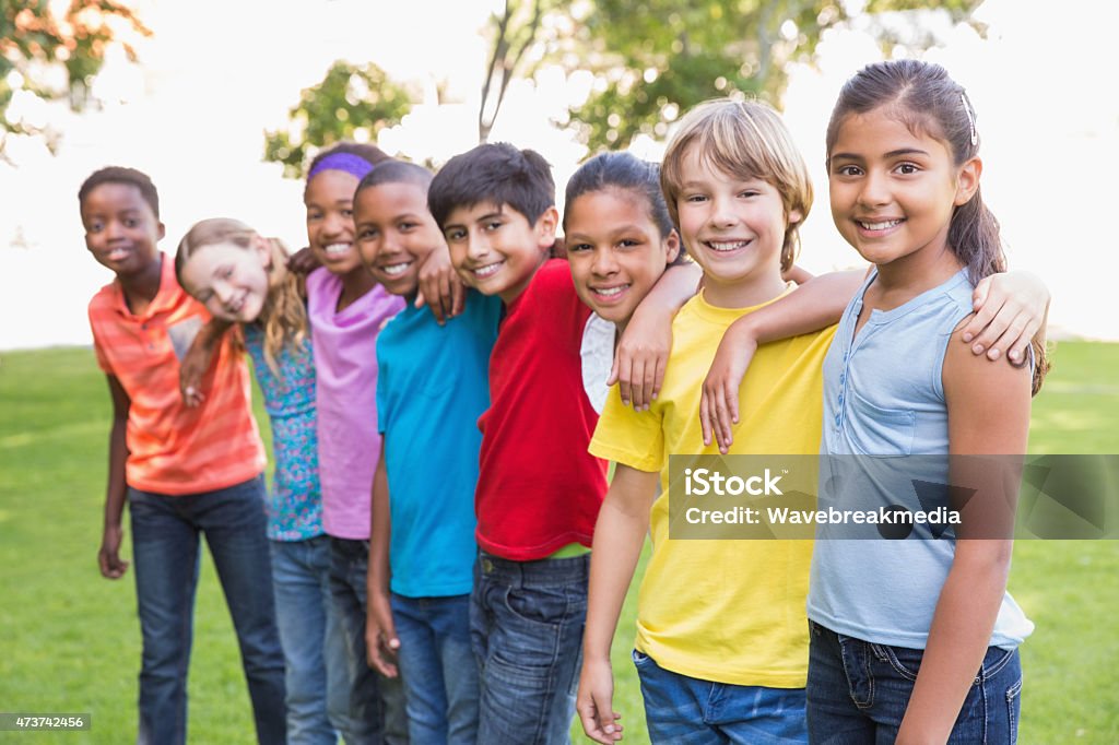 Happy friends in the park Happy friends in the park on a sunny day  Child Stock Photo