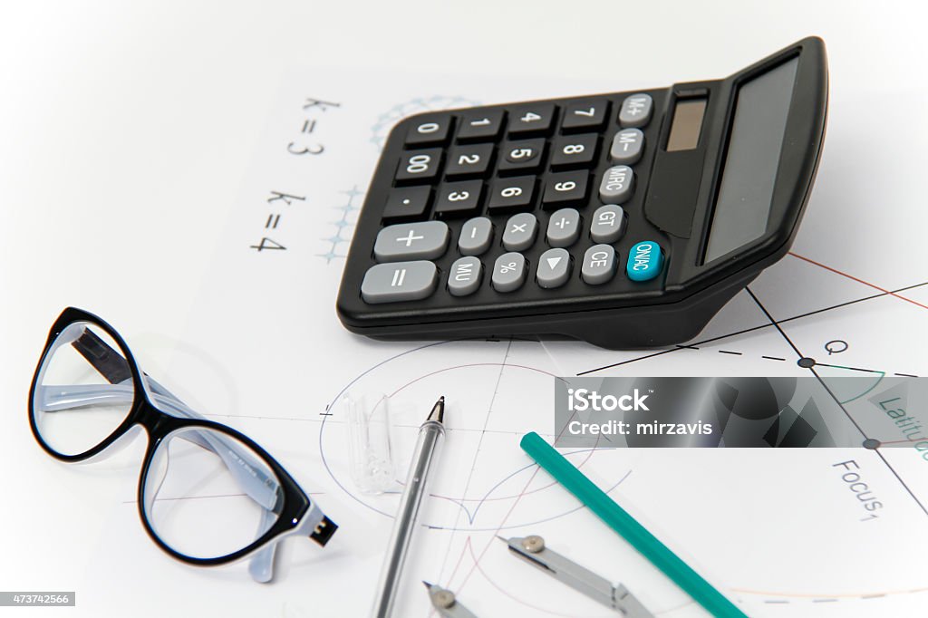 Business Architectural project, pair of compasses, glasses, rule Photo of the Business Architectural project, pair of compasses, glasses, rulers and calculator - business concept 2015 Stock Photo