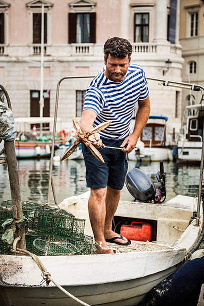 istock Fisherman working on the fish boat 473745730