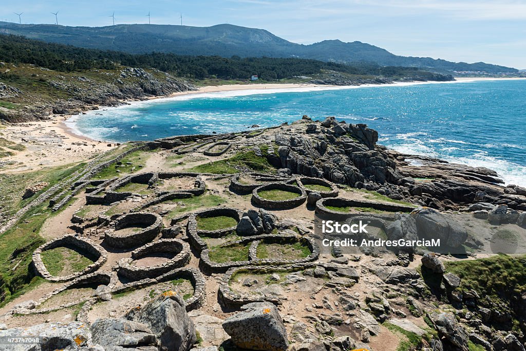 Castro de Baroña and Atlantic Ocean in Galicia Panorama view of the Castro de Baroña, a fort located in the parish of Baroña in A Coruña, Galicia. Built on a peninsula, it was inhabited from the first century BC to the fist century AD. Castro - Chiloé Island Stock Photo