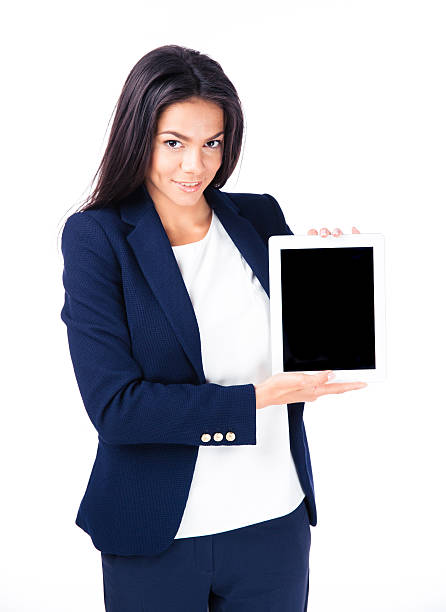 istock Smiling businesswoman showing tablet computer screen 473753808