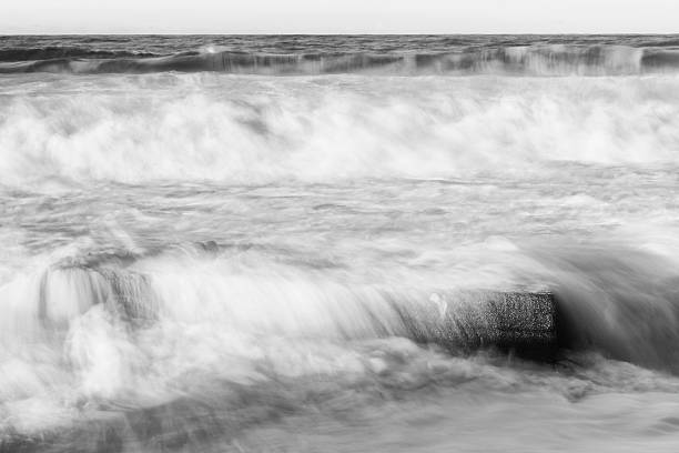 istock Sea foam on Snapper Rocks in the afternoon. 473755838