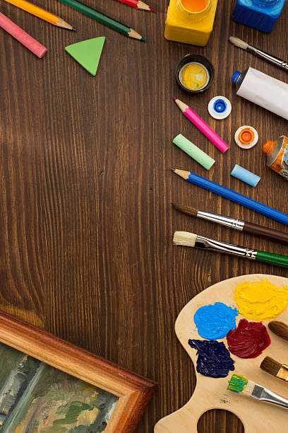 istock paint supplies and brush on wood 473761586