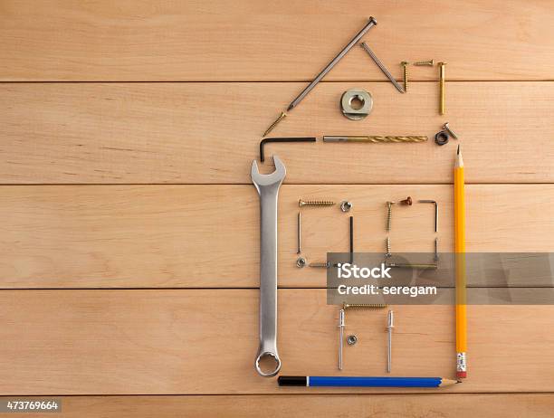 Engineering Concept On Wood Stock Photo - Download Image Now - 2015, Adjustable Wrench, Bolt - Fastener