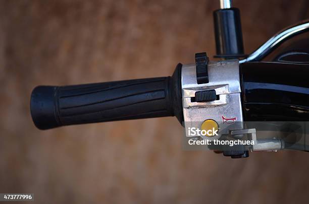 Switch Control On A Motorcycle Handlebar Stock Photo - Download Image Now - 2015, Chrome, Close-up