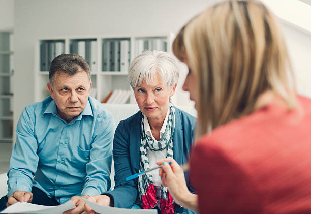 istock Mature Couple Meeting with Financial Advisor. 473781448