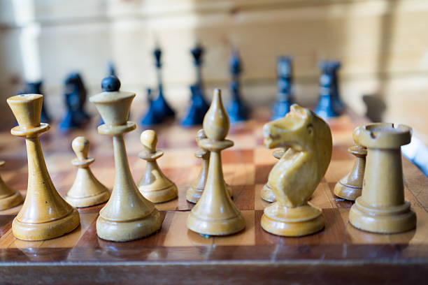 istock Vintage wooden chess pieces 473781484