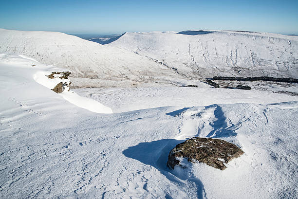 istock Stunning landscape views from top of snow covered mountains 473784776