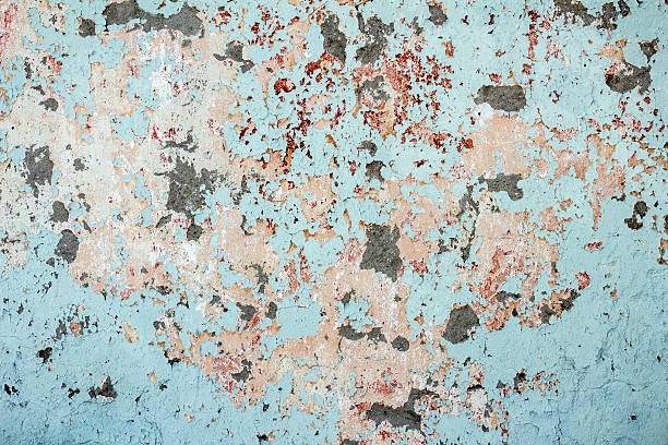 istock Old textured colorful wall with stains 473785274