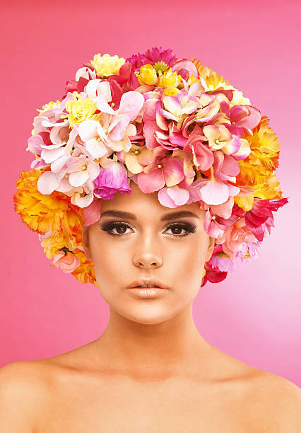 istock Beautiful woman with flower wreath 473785358