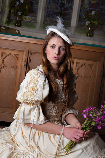istock Medieval Lady In Church 473786164