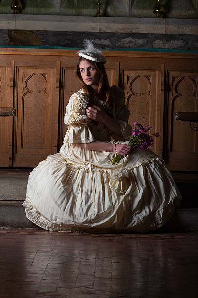 istock Medieval Lady In Church 473786172