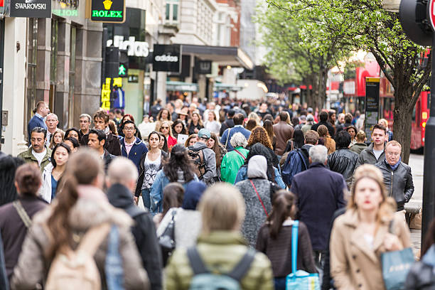 Crowded sidewalk on Oxford Street in London stock photo