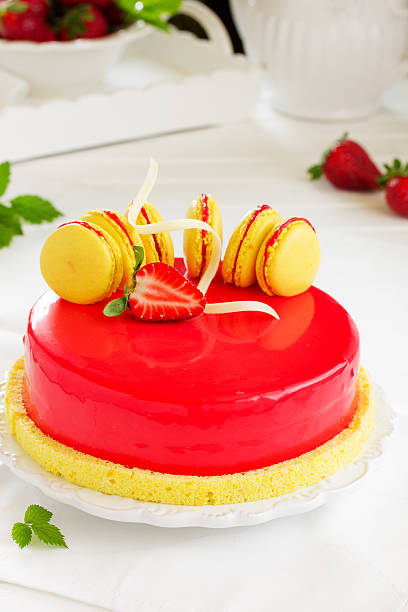istock Lemon-strawberry cake with makarons. 473789748