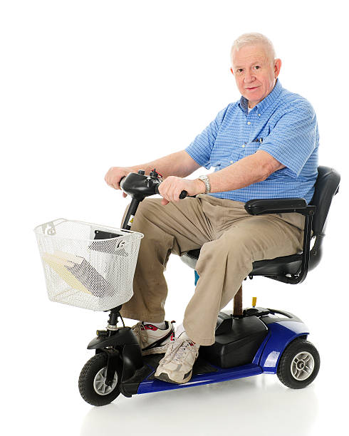 Senior Happy with His Scooter stock photo