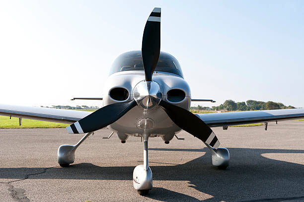 Propellor hub and engine cowling of private light aircraft. Full-frame RAW conversion. No sharpening. Similar shot for jet power: http://www1.istockphoto.com/file_thumbview_approve/8813336  .